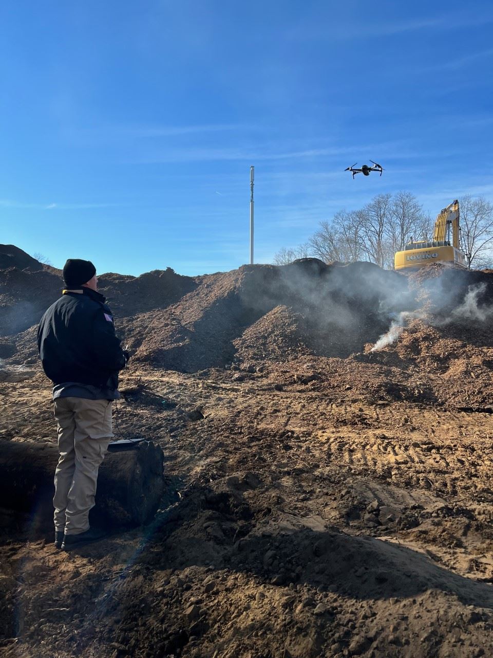 Pictured is Officer Dan Main operating a drone.
